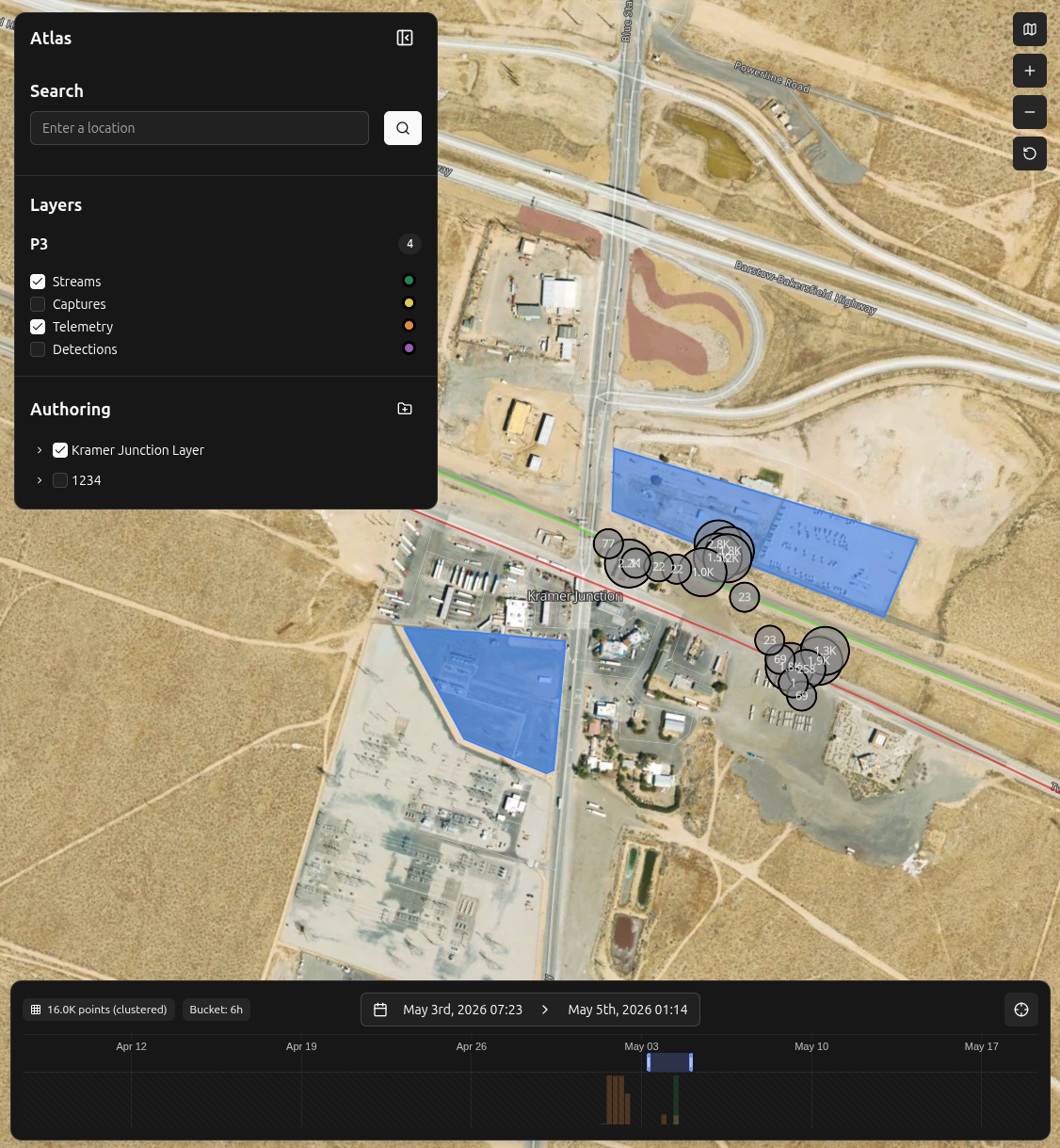 Spaces Atlas map view with satellite imagery, telemetry clusters, custom authoring layers, and a temporal timeline